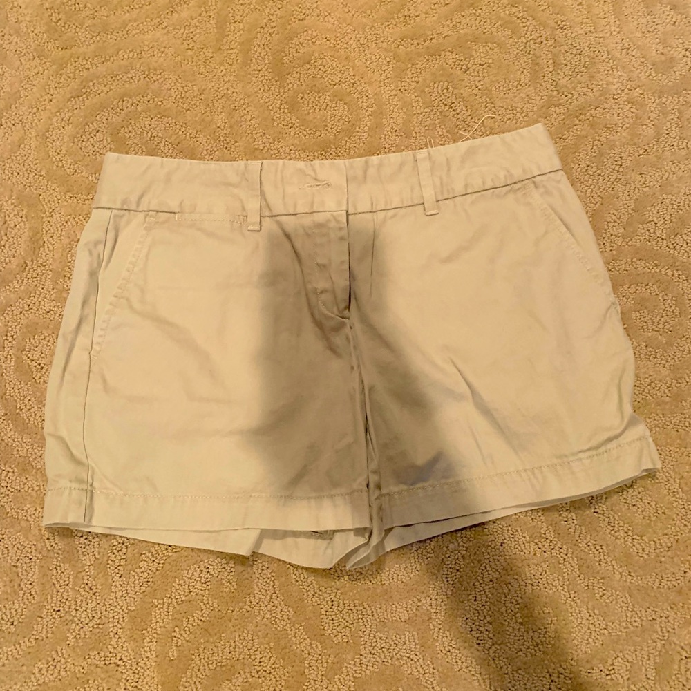 2 Loft Dress Shorts. One is Navy the other is Khaki. Both size 4.